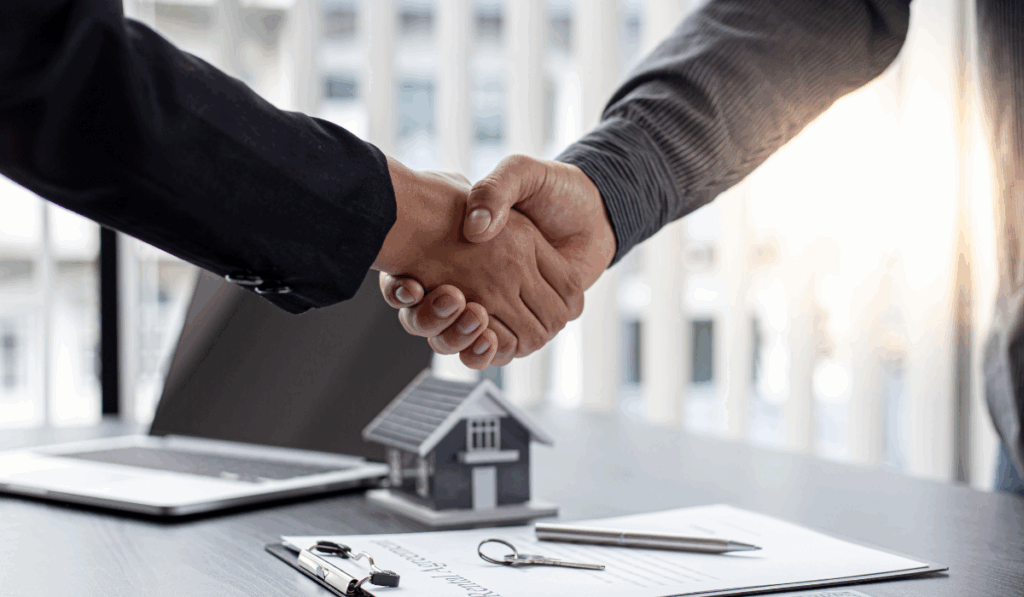shaking hands with GPS Renting property manager